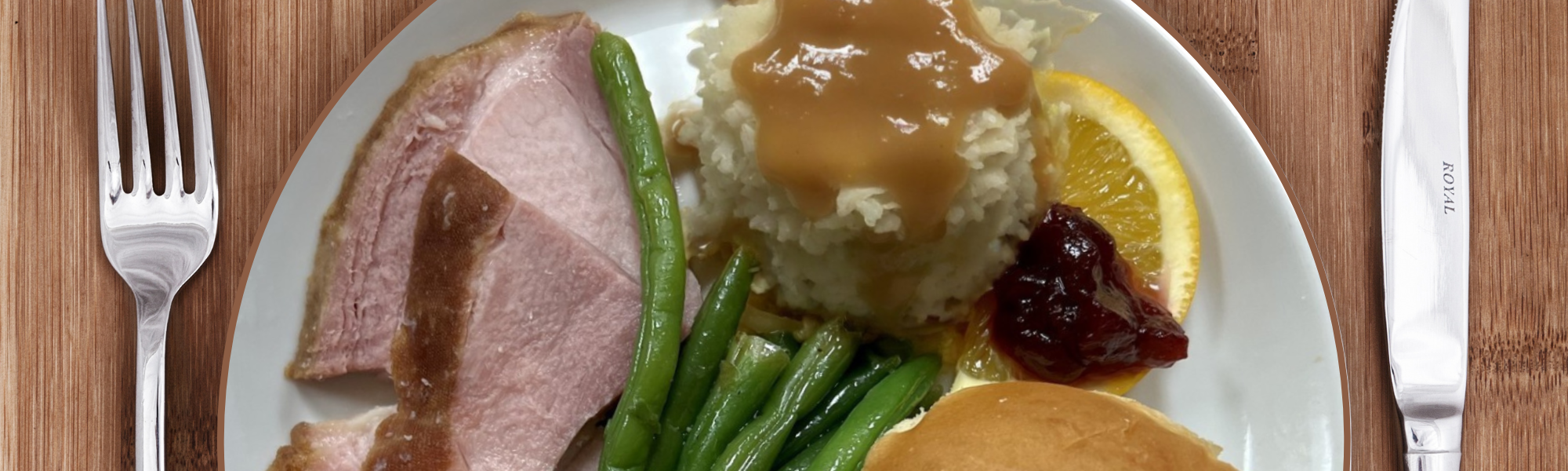 Ham dinner on a plate