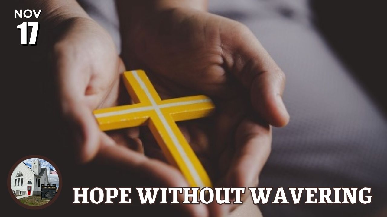 open hands holding a yellow cross